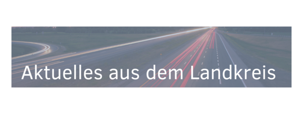 Header text reads "Aktuelles aus dem Landkreis," which translates to "Current news from the district." The background features a blurred image of a road, suggesting connectivity and movement.