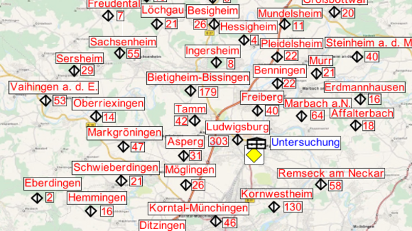 A detailed map highlighting various locations in a central area, marked with red labels identifying towns and cities. A yellow star denotes the location "Untersuchung" at the center, with navigational symbols present in the corners. The background features a light green terrain.