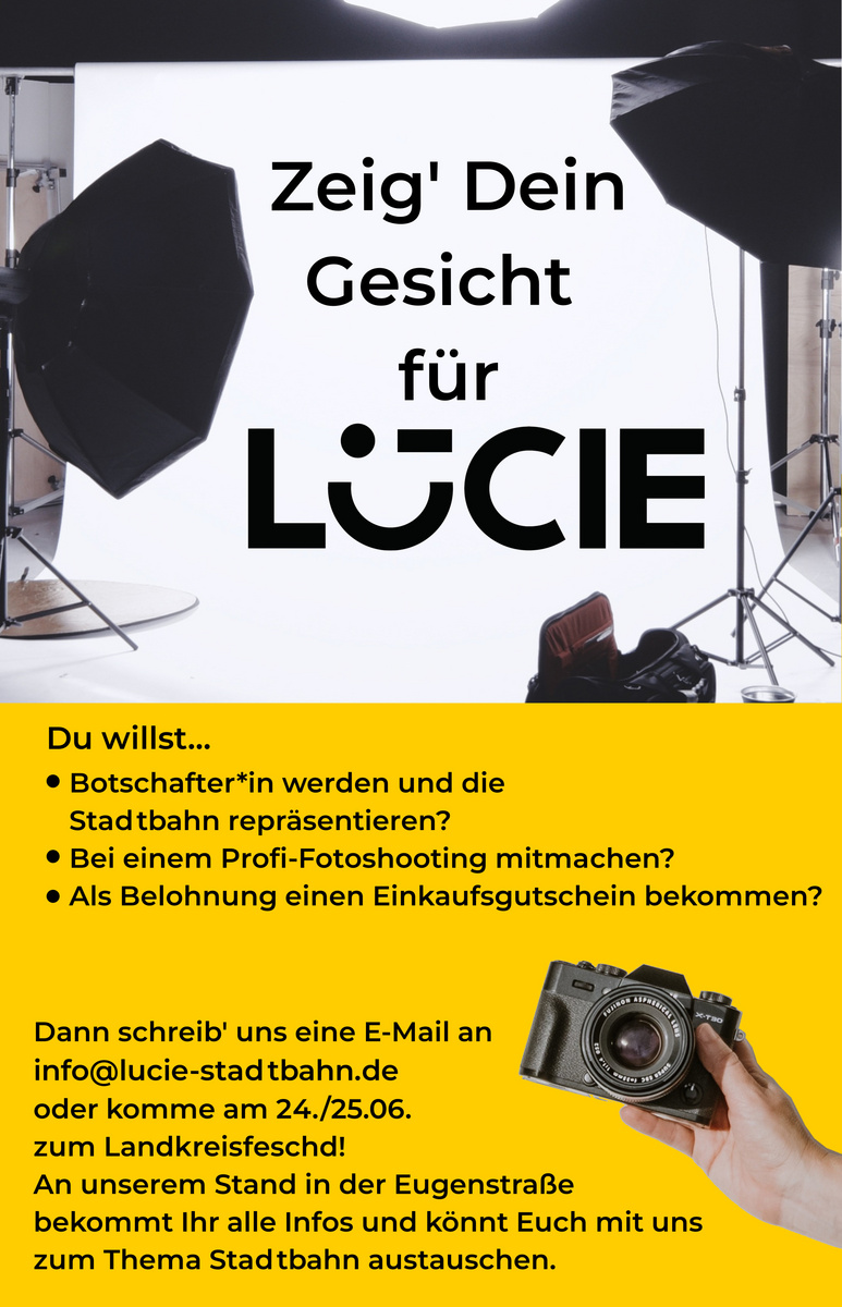 Ein Plakat mit dem Text „Zeig' Dein Gesicht für LUCIE“. Es richtet sich an Interessierte, die Bot-schaften, an einem Fotoshooting teilnehmen oder einen Einkaufs-gutschein gewinnen möchten. Kontaktmöglichkeiten werden angegeben, und es gibt Informationen zu einem Stand in der Eugenstraße.